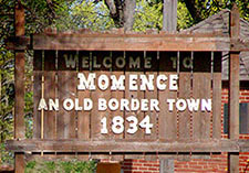 Welcome sign on Route 1 south side.